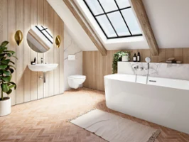 Une baignoire O.novo avec un lavabo et des toilettes. Une salle de bains moderne avec une baignoire, un lavabo mural, un miroir rond et des WC de la collection O.novo. Une grande lucarne et une plante en pot mettent la pièce en valeur. Des notes de bois et des carreaux à motif à chevrons donnent à la pièce une touche rustique.