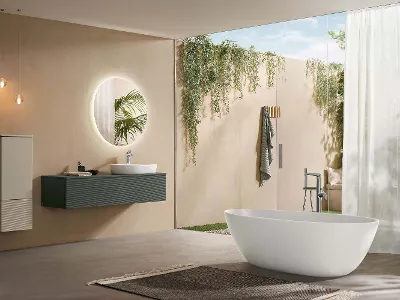 A modern bathroom with a white Antao bath and washbasin.