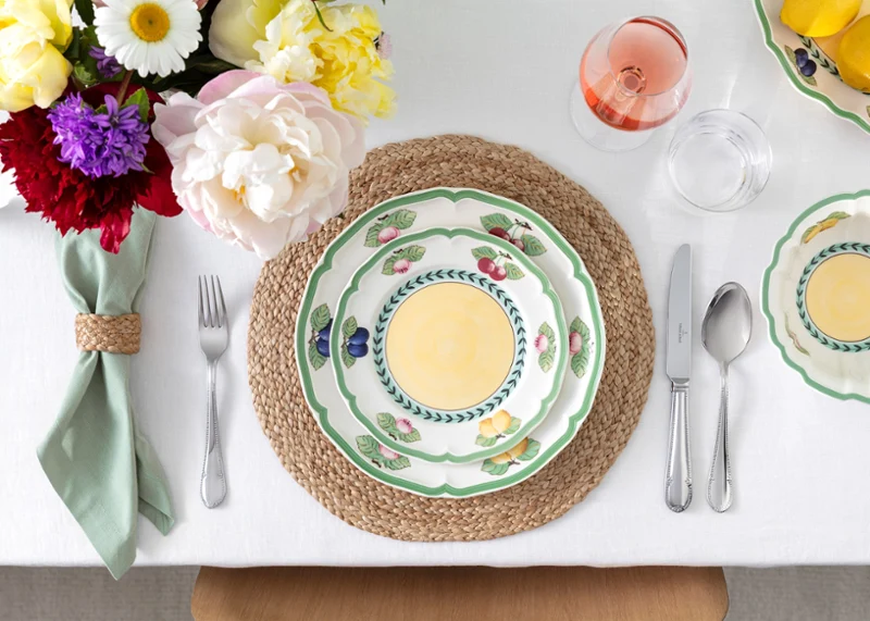 French Garden collection paired with Mademoiselle flatware Aerial view of French Garden plate paired with Mademoiselle flatware.