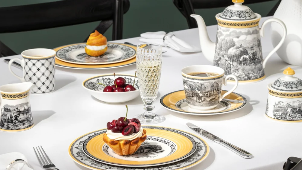 Audun full collection table paired with clear Boston glassware Elegant dining table featuring Audun collection paired Boston glassware with an assortment of deserts.