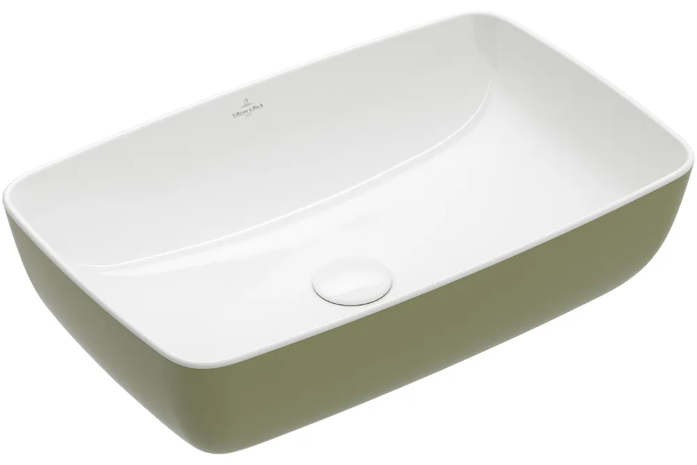 Rectangular white ceramic washbasin with an oval green outer surface and a drain positioned in the centre.