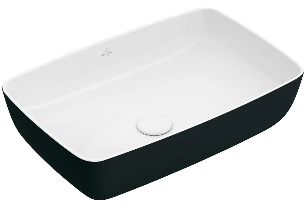 Rectangular white ceramic washbasin with a black outer surface and a drain positioned in the centre.