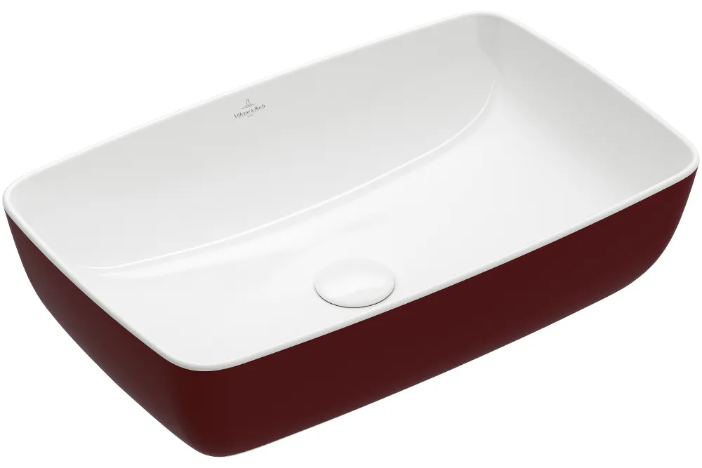 Rectangular white ceramic washbasin with a dark-red outer surface and a drain positioned in the centre.