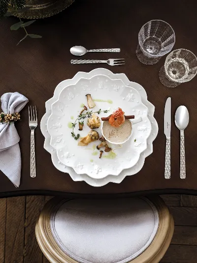 Elegant table setting with gourmet dish on Toy's Delight Royal Classic plates, ready for a fine dinner.