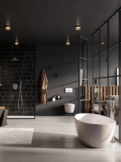 Un bagno moderno con pareti nere e vasca Antao bianca di Villeroy & Boch.