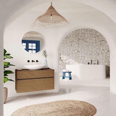 Un bagno bianco con un arco e un lavabo Loop & Friends bianco.