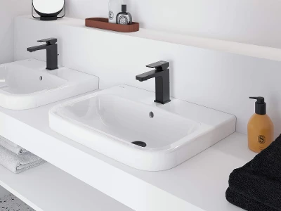 Baño moderno con lavabo blanco Architectura Cuarto de baño moderno con dos lavabos blancos y grifería negra sobre una repisa. Sobre la repisa hay un dosificador de jabón y un espejo. Las toallas negras descansan ordenadamente en un estante inferior.