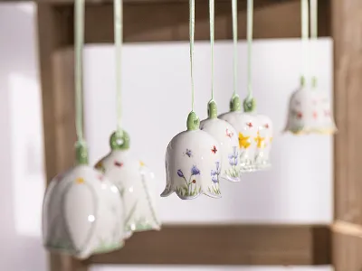 several flower bell ornaments hanging