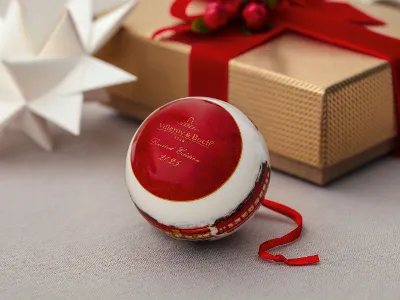 Red Villeroy & Boch Annual Christmas Edition 2025 ball with elegant gold stamp