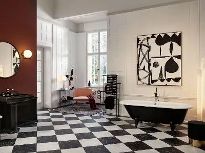 Vasca da bagno Hommage nera in un bagno elegante Un bagno con pavimento a scacchi bianchi e neri e vasca da bagno Hommage nera di Villeroy & Boch.