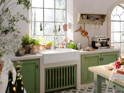 Lavello a doppia vasca nella cucina stile casa di campagna Un lavello in una cucina di campagna con ante in legno verde, utensili da cucina e tante spezie ed erbe aromatiche in giro.