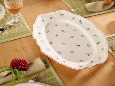 Petite Fleur Serving Platter Close-up of a Petite Fleur serving platter featuring a delicate floral pattern on white porcelain.