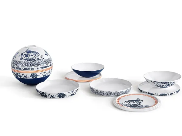 Two La Boule Paradiso, assembled as a sphere and as seven individual pieces La Boule Paradiso: A set of blue and white plates and bowls, individually and assembled in a sphere.