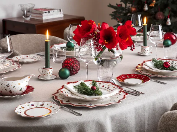 Festive holiday table with Toys Delight dinnerware and glasswarewasre A cheerful holiday table adorned with Toys Delight dinnerware and exquisite glassware, ideal for celebrating the season
