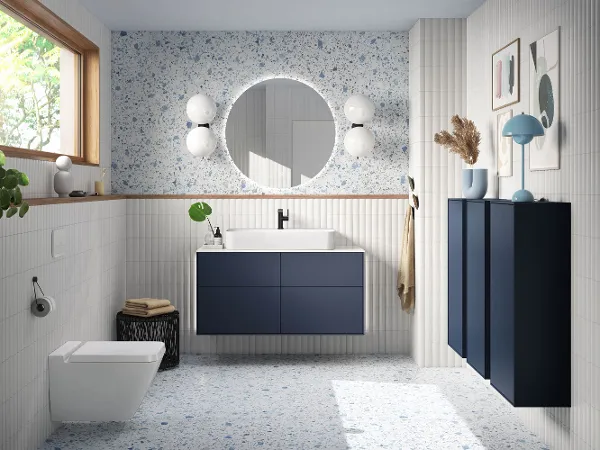 Finion Midnight Blue Matt vanity unit and wall cabinet Finion Midnight Blue Matt vanity unit and wall cabinet in a modern bathroom with light-blue accents by Villeroy & Boch.