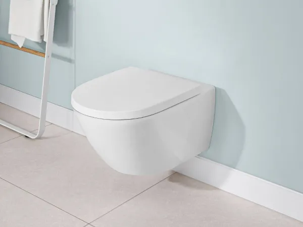 White Subway 3.0 toilet in a blue bathroom A white Subway 3.0 toilet in a bathroom with blue walls.