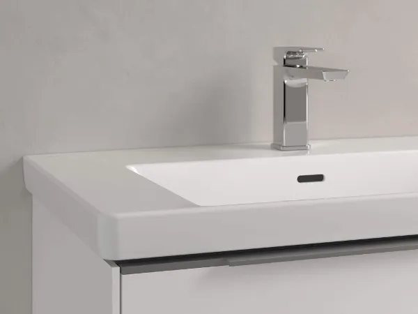 Un lavabo blanc Subway 3.0 avec une robinetterie chromée Un lavabo blanc Subway 3.0 avec une robinetterie chromée.