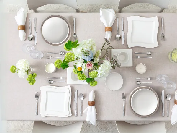 NewWave collection paired with NewMoon dinnerware Modern NewWave table setting styled with NewMoon dinnerware for a contemporary dining look.