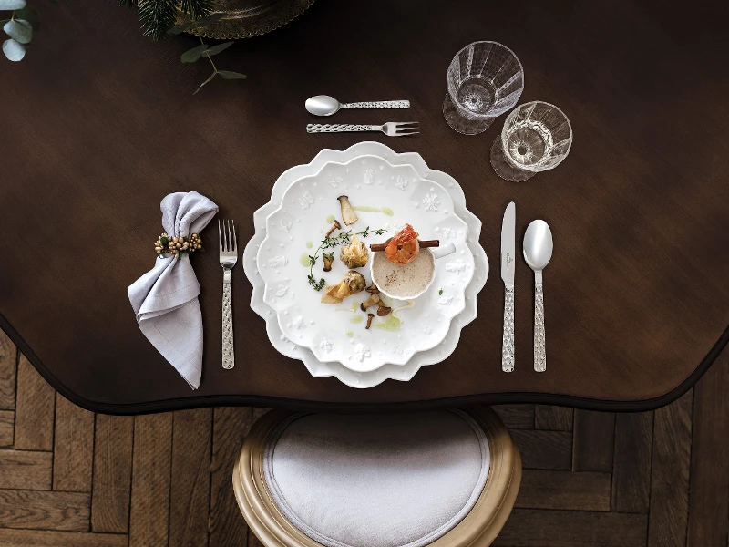 Elegant table setting with gourmet dish on Toy's Delight Royal Classic plates, ready for a fine dinner.