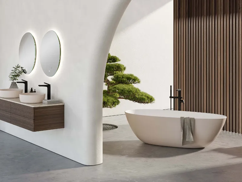 Une salle de bains moderne avec des touches de bois foncées et une baignoire Antao ainsi qu’un lavabo en beige.