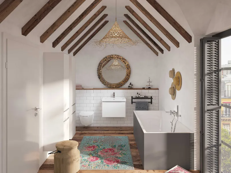 Un bagno con soffitto mansardato in legno, pareti bianche, una vasca Subway Villeroy & Boch, uno specchio rotondo e un tappeto colorato sul pavimento in legno.