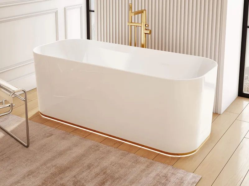 Una vasca da bagno Finion bianca con illuminazione e pareti beige.