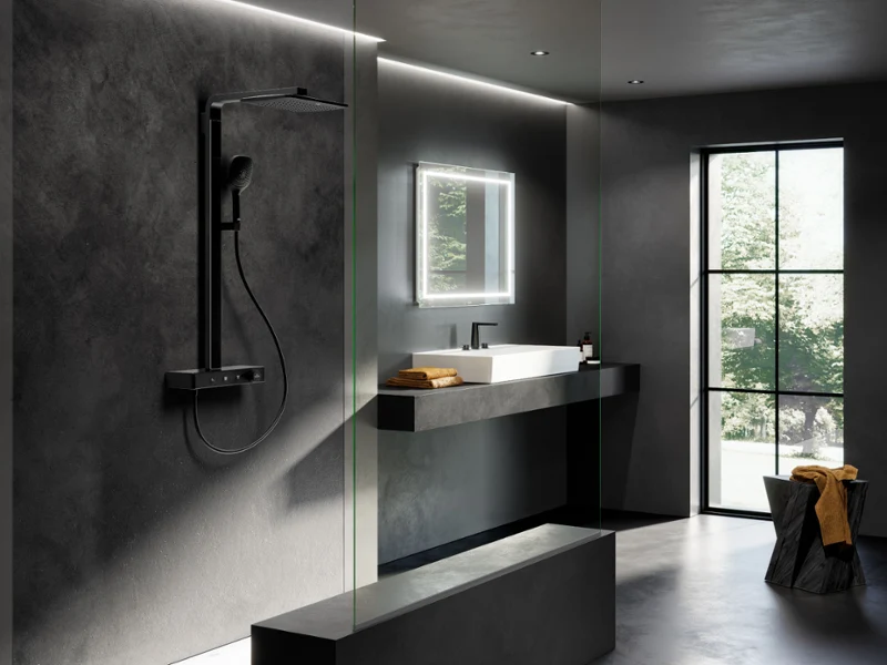 Elegant bathroom with Memento 2.0 washbasin, dark walls and glass shower – minimalist design with strong character in all-black style.