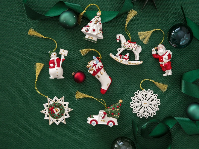 nostalgic christmas ornaments laying on green background