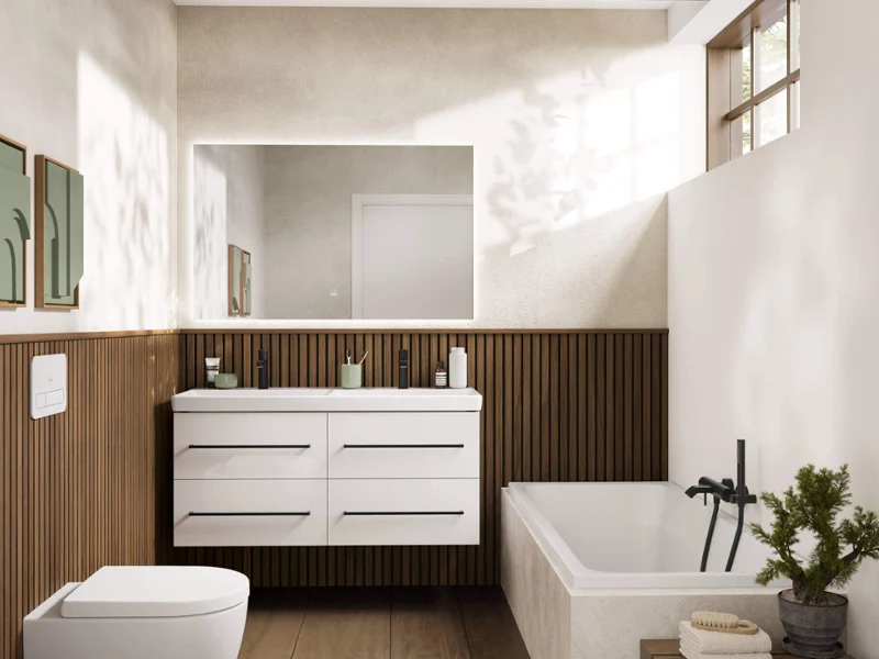 Salle de bain Avento chaleureuse de style Japandi avec accents de bois, meuble vasque blanc, baignoire et robinetterie noire moderne dans une atmosphère calme et naturelle.