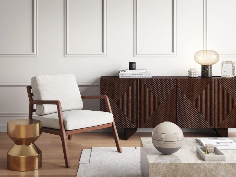 Un exemplaire de La Boule beige de Villeroy & Boch posée sur une table basse dans un salon blanc avec des meubles en bois sombres.