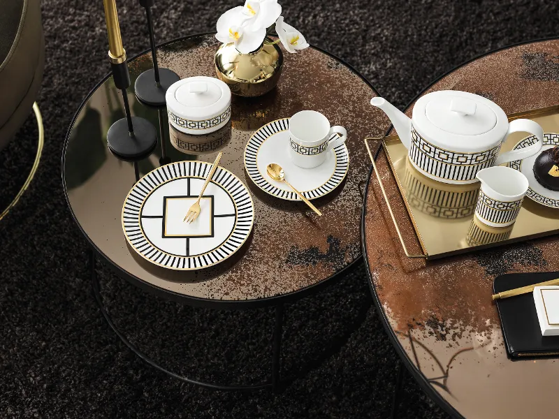 Metrochic Collection shown on coffee table Metrochic Collection shown on coffee table in an everyday setup with assortments of desert.