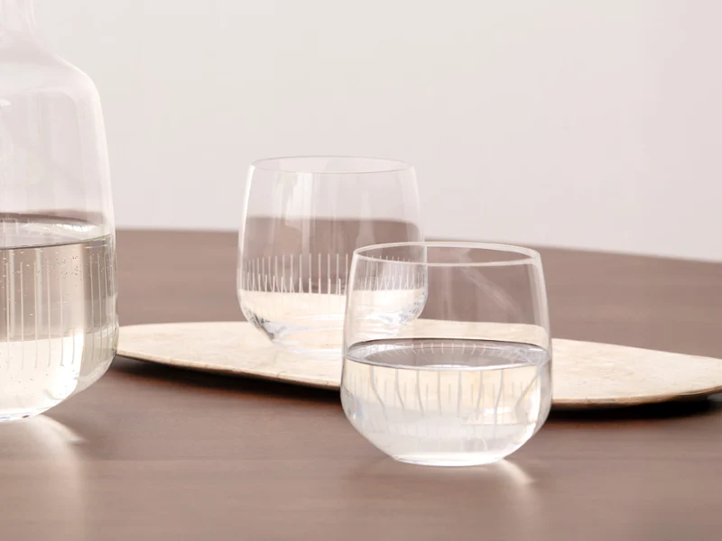 Afina water glasses close-up showcasing clear crystal design and refined texture.