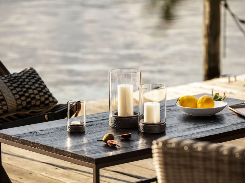 A versatile collection of Manufacture Rock candle holders, summery outdoor atmosphere, available in various sizes, ideal for stylish table decoration.