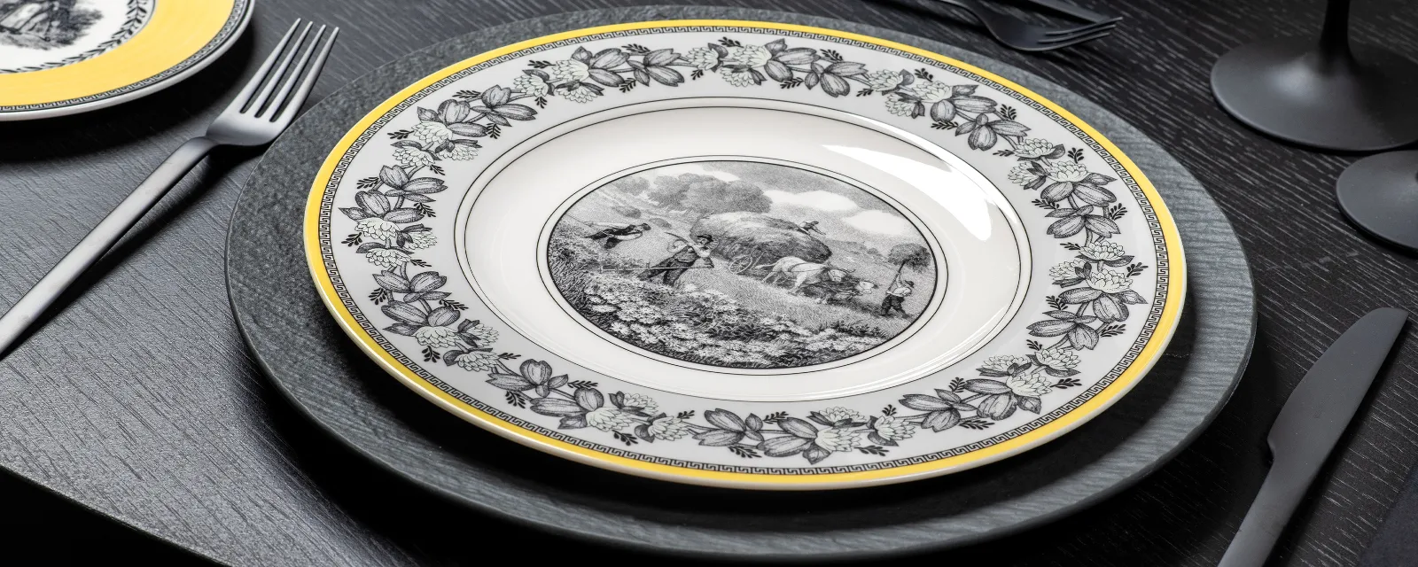 Audun plate in close-up with dinnerware and glasses from Manufacture Audun plates in close-up mixed with dinnerware and glassware from Manufacture