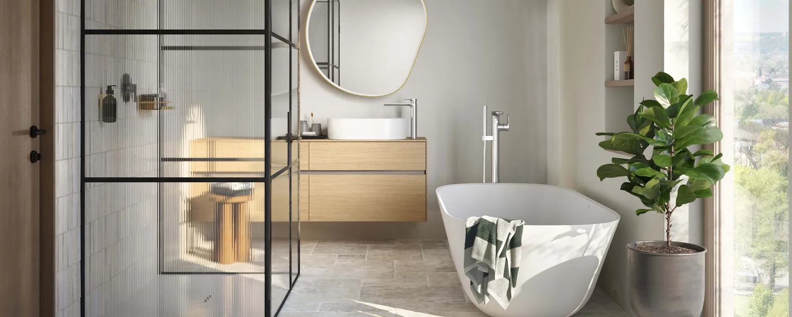 Theano Curved Edition bath in a light-coloured bathroom A white Theano Curved Edition bath in a light-coloured bathroom with a floor-to-ceiling window.