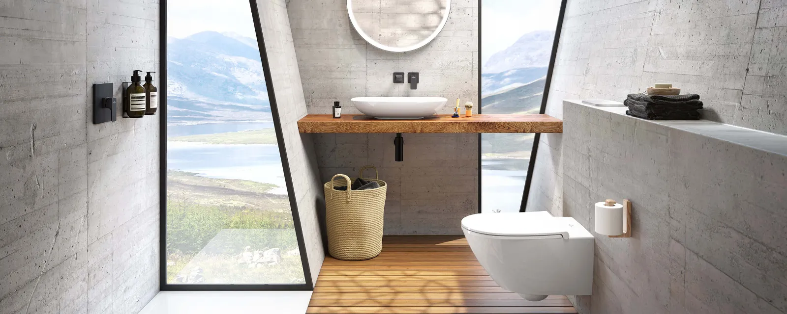 Specchio Subway 3.0 con lavabo da appoggio Loop & Friends bianco Bagno moderno con pareti in cemento, ampia finestra con vista sul lago, specchio rotondo Subway 3.0 e lavabo da appoggio bianco Loop & Friends