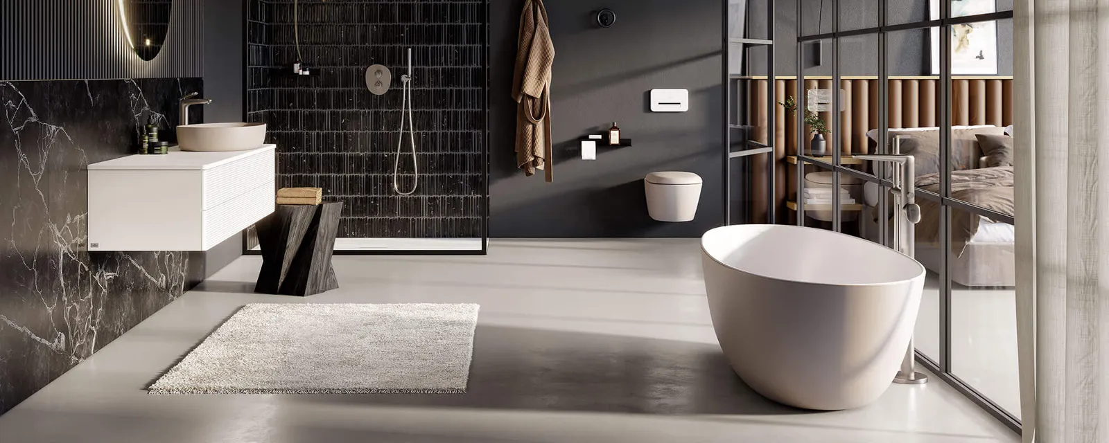 Un bagno moderno con pareti nere e vasca Antao bianca di Villeroy & Boch.